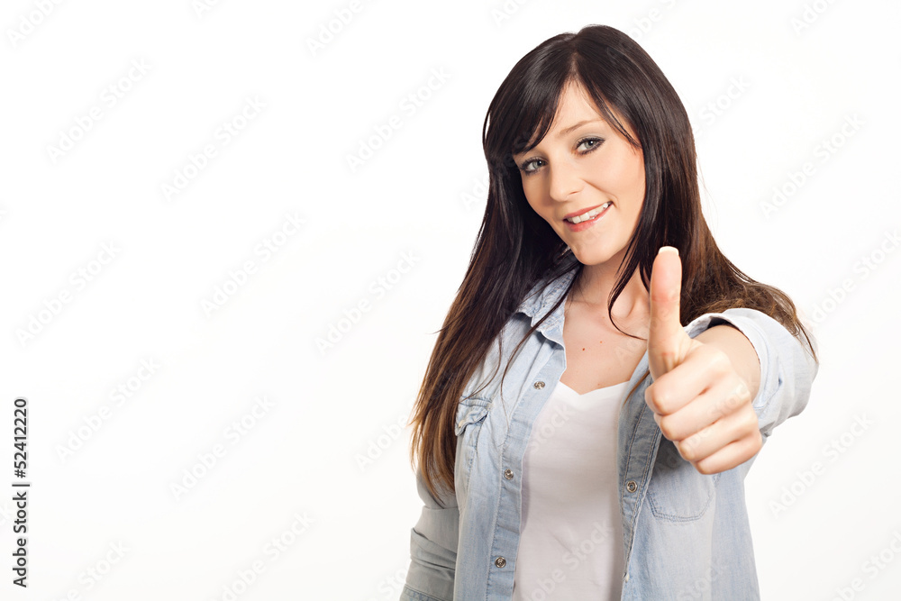 portrait of a beautiful young woman thumbs up