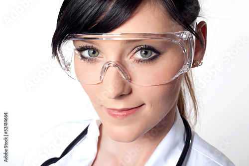 Portrait of female doctor with protective glasses