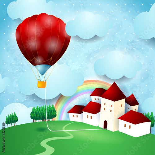 Hot air ballon on fantasy landscape