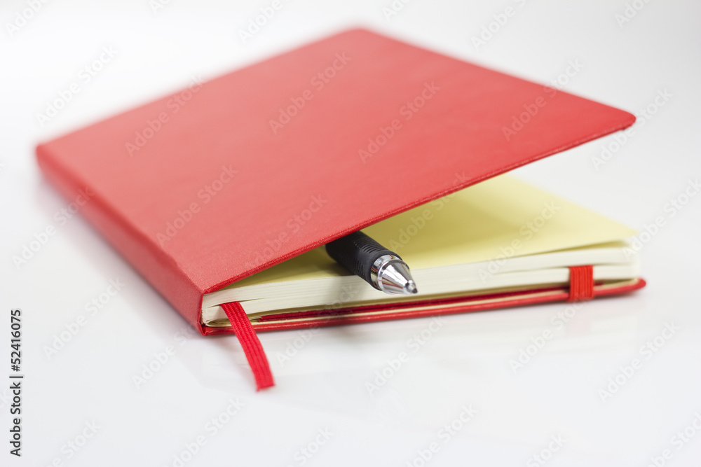 Red calendar with pen Red calendar with pen
