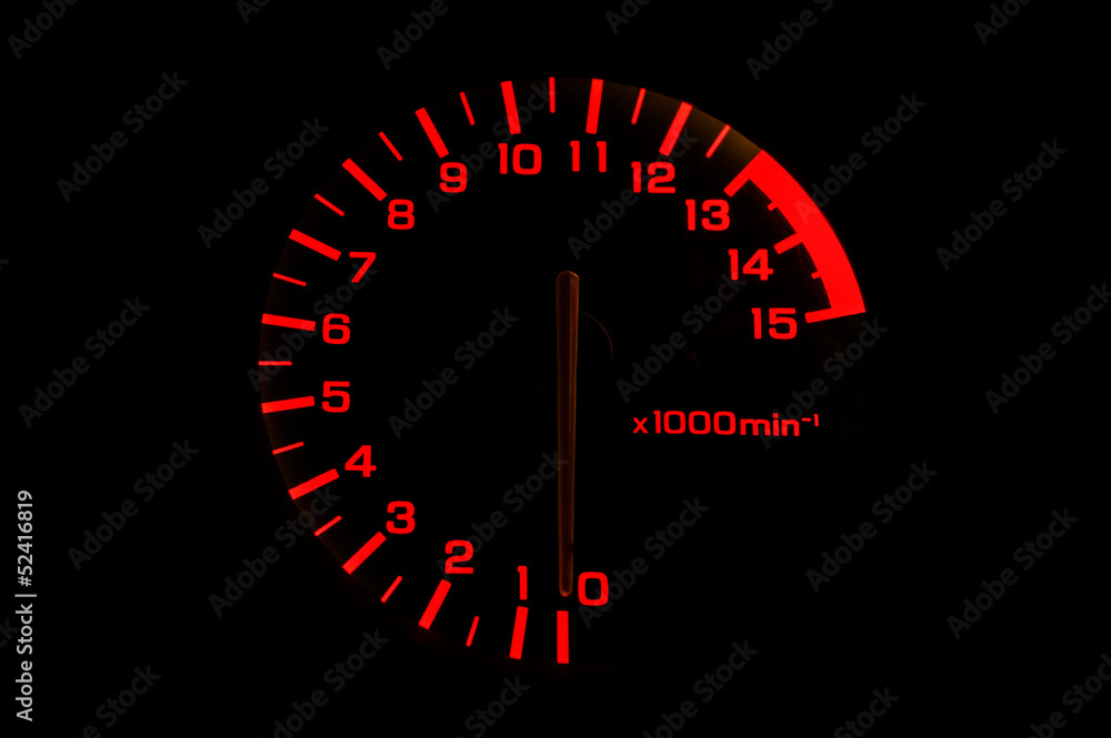 automobile tachometer on black background automobile tachometer on black background