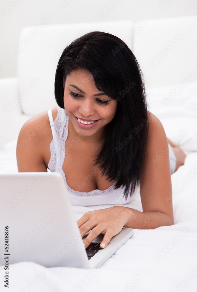 Young Woman Using A Laptop Young Woman Using A Laptop