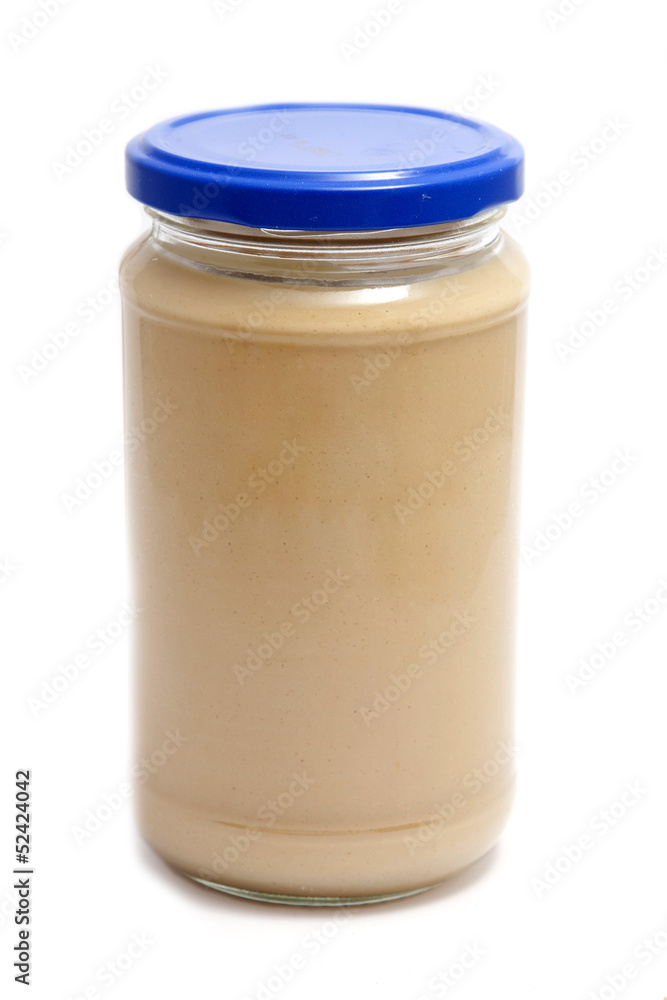 Jar of peanut butter on a white background Jar of peanut butter on a white background