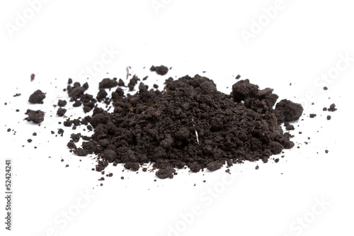 a pile of dirt on white
