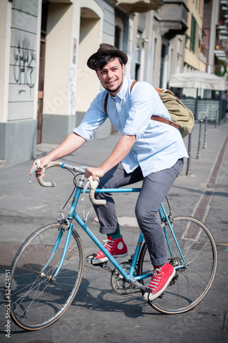hipster young man on bike