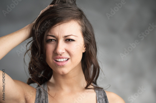 Confused Young Caucasian Woman Portrait