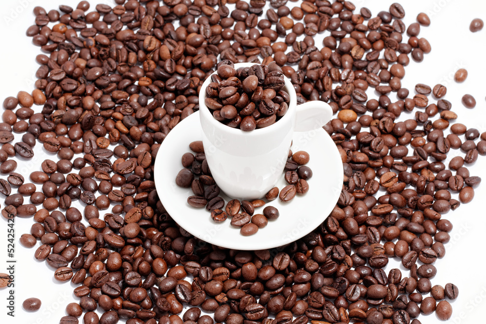 Fototapeta premium a cup of coffee beans on white background