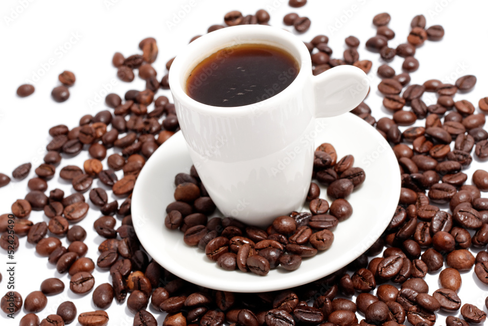 a cup of espresso with coffee beans on white a cup of espresso with coffee beans on white