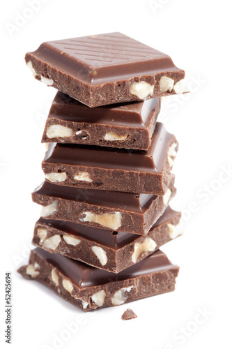 chocolate pieces stacked on white background