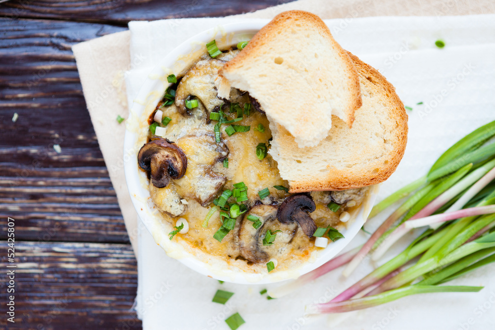 mushroom casserole with green garlic, top view mushroom casserole with green garlic, top view