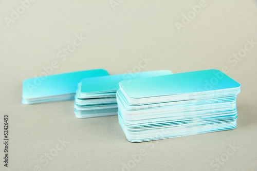 Stack of business cards  on color background