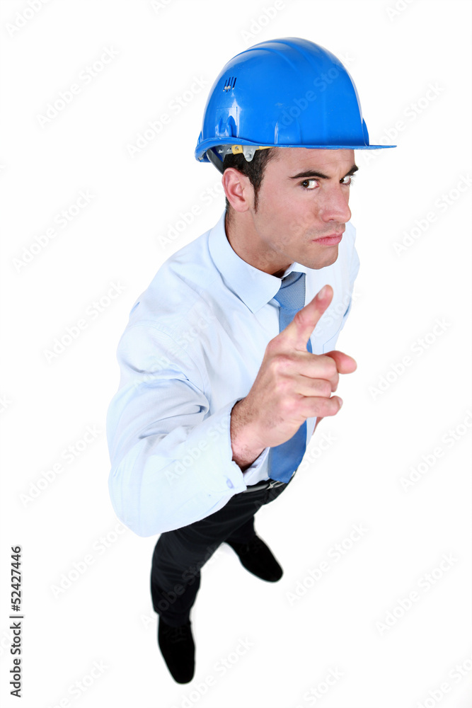 helmeted foreman with threatening look