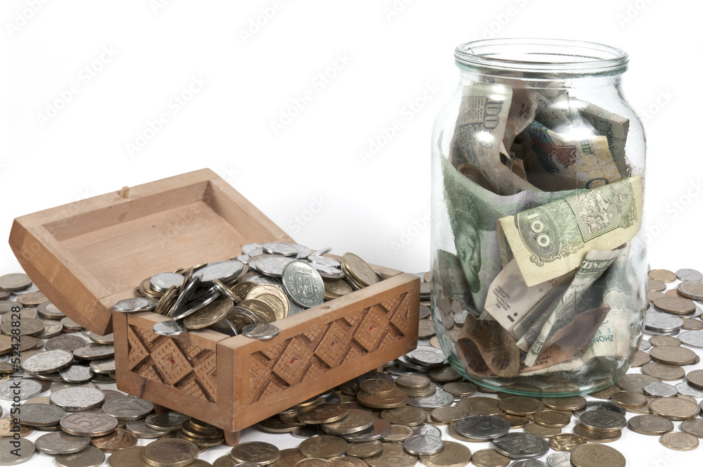 Fototapeta premium The box with coins on isolated background