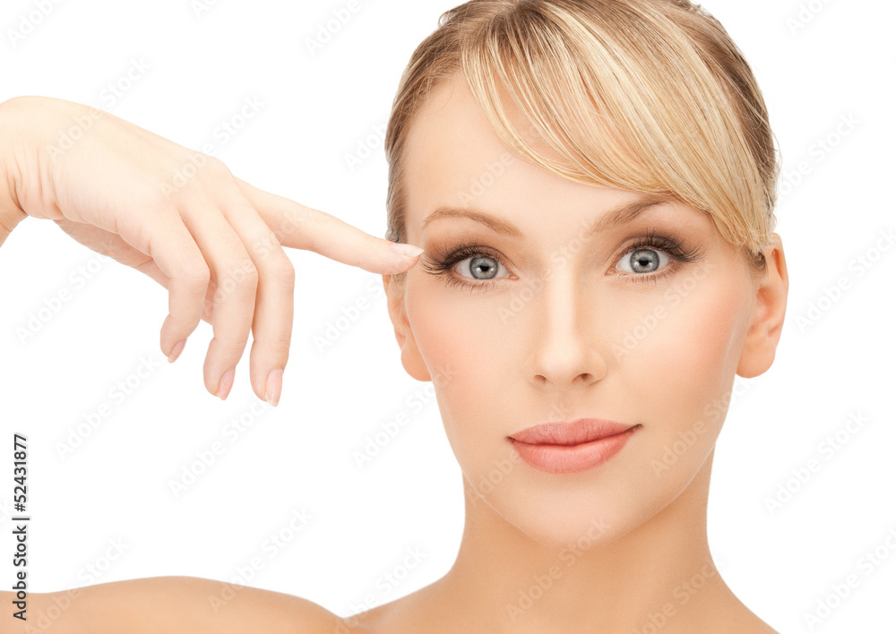 Naklejka premium beautiful woman touching her eye area