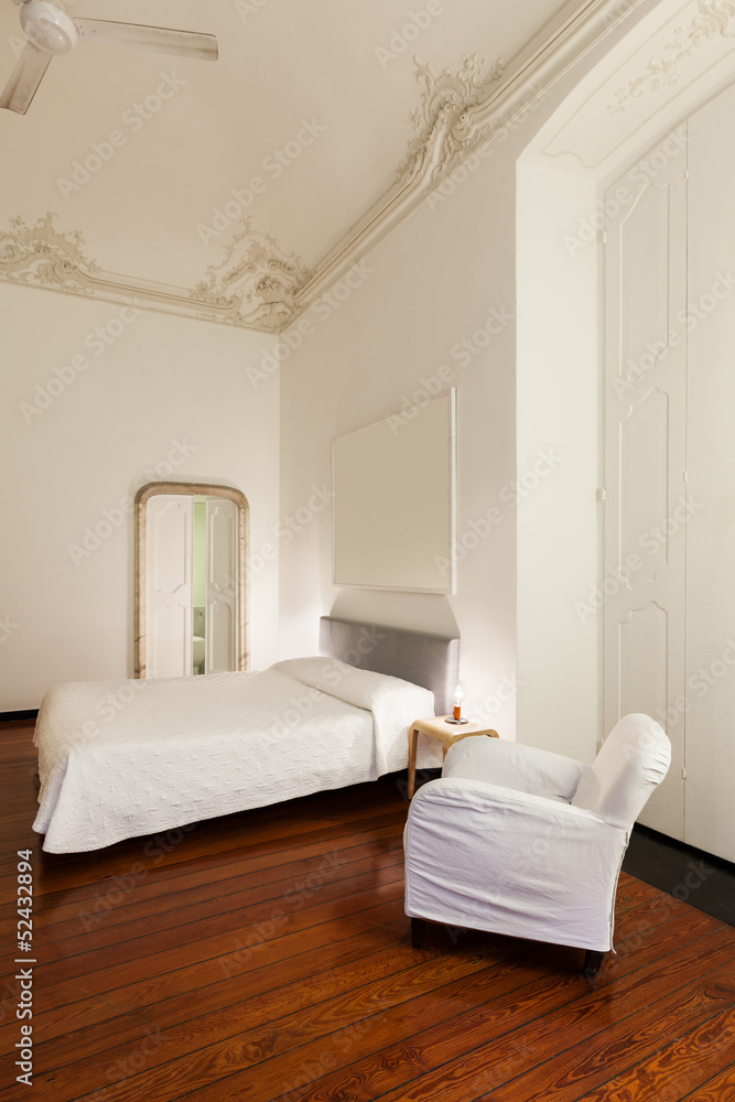 Fototapeta premium beautiful hotel room in old historic building, double room