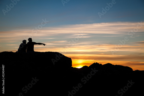 Couple having relax at sunset in Tofino, Canada