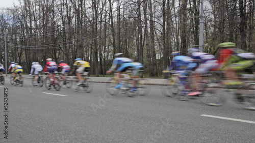 Group of cyclists in action during a cycling tour