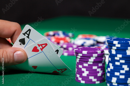 Colorful poker chips and two Ace photo