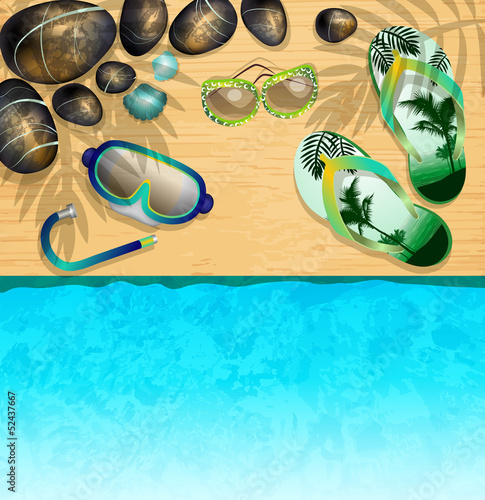 Flip-flops, Mask for Diving, sunglasses and stones on the beach