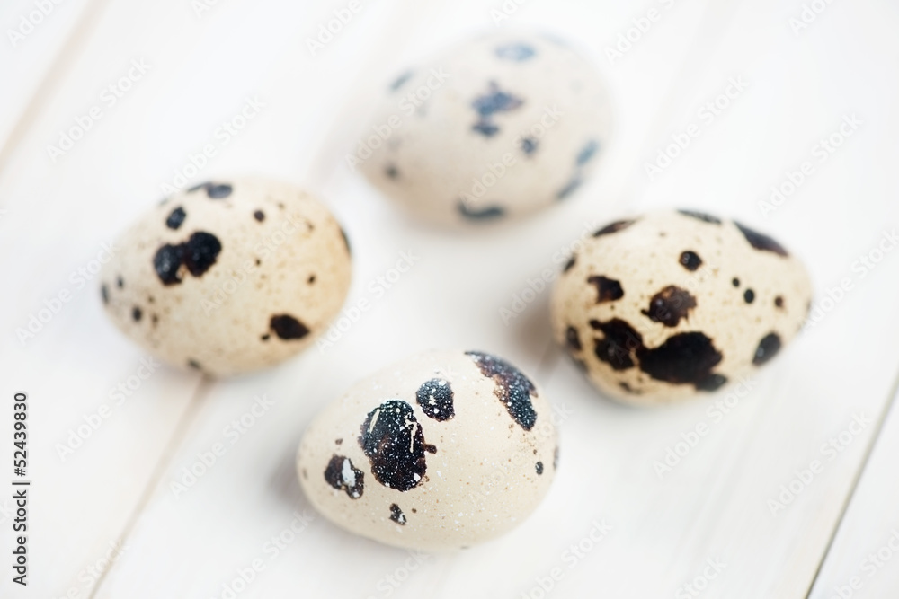 Ingredients: quail eggs on wooden boards Ingredients: quail eggs on wooden boards