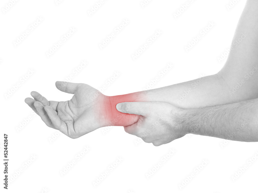 Acute pain in a man wrist. Male holding hand to spot of wrist pa Acute pain in a man wrist. Male holding hand to spot of wrist pa