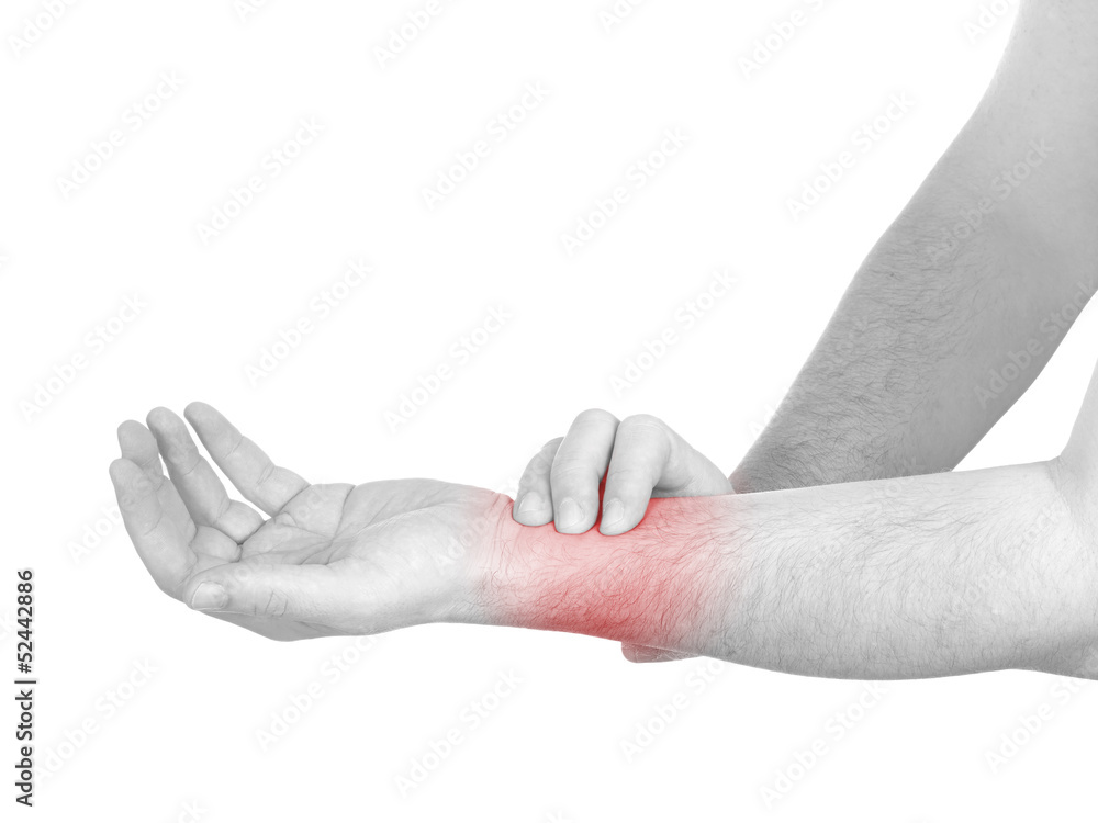 Acute pain in a man wrist. Male holding hand to spot of wrist pa Acute pain in a man wrist. Male holding hand to spot of wrist pa