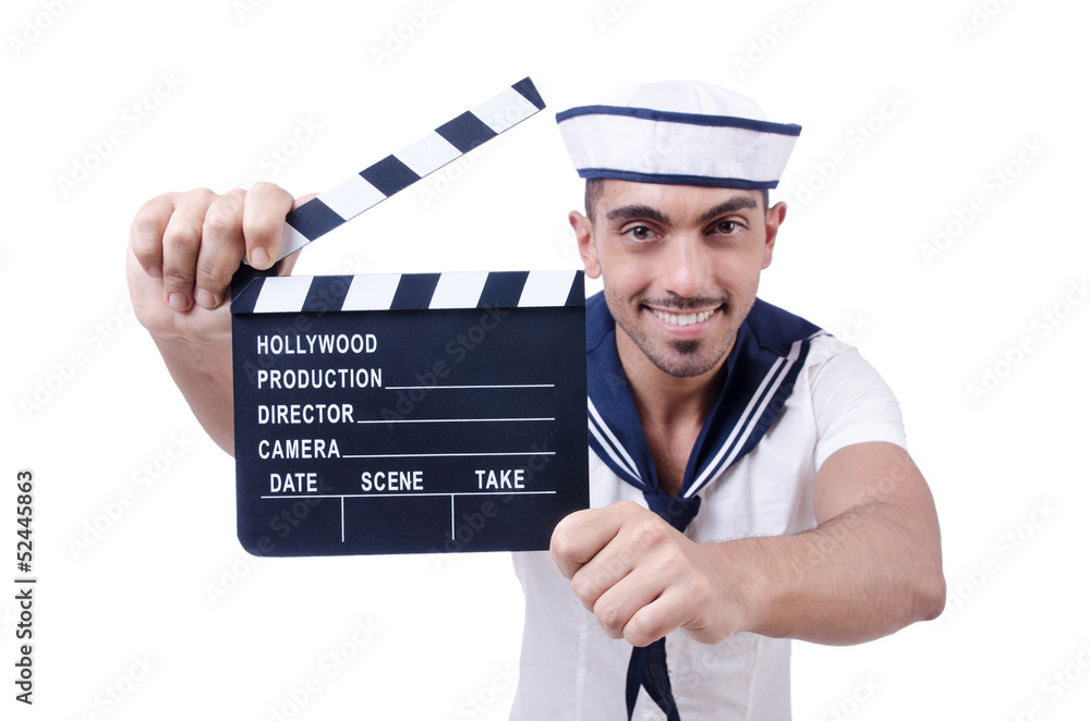 Sailor with movie clapper on white