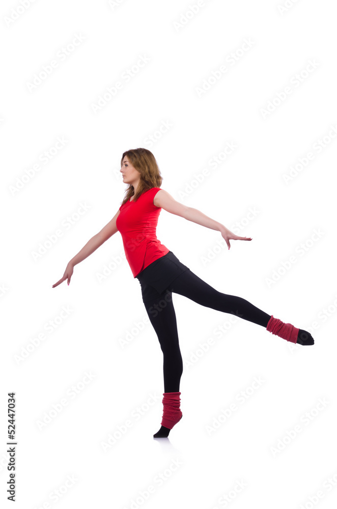 Young gymnast exercising on white