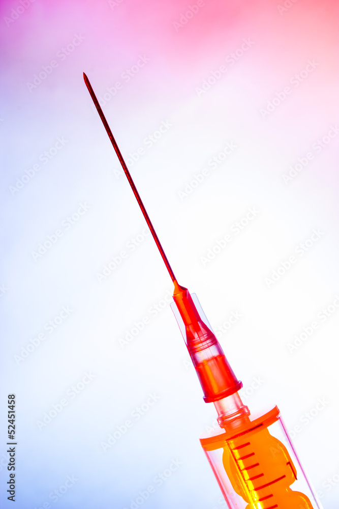 medical syringe on gradient background medical syringe on gradient background