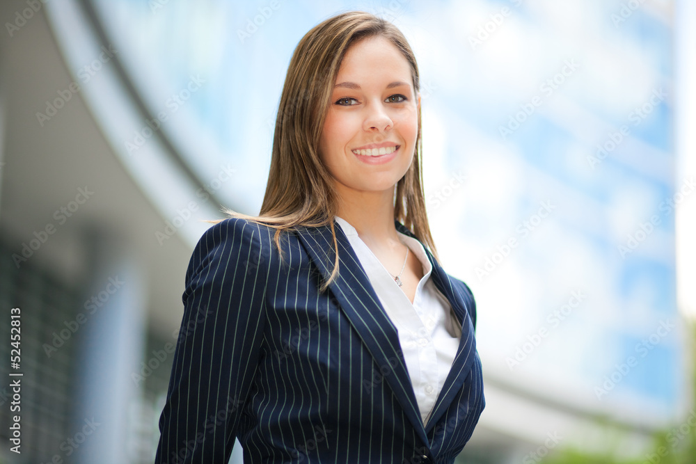 Neautiful female executive in an urban setting Neautiful female executive in an urban setting
