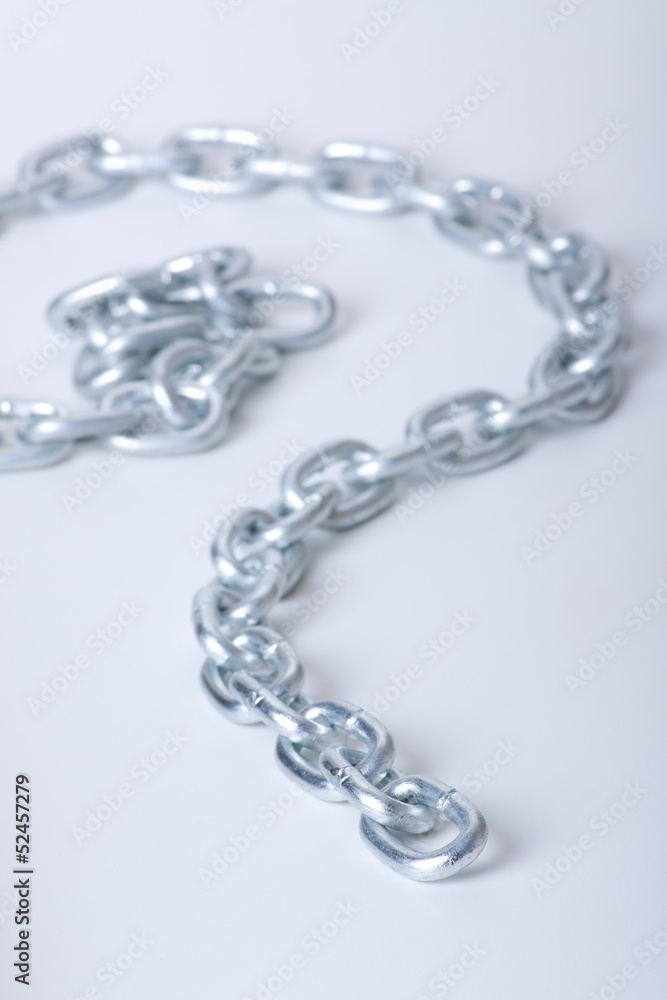 Fototapeta premium metal links of chain on a white background