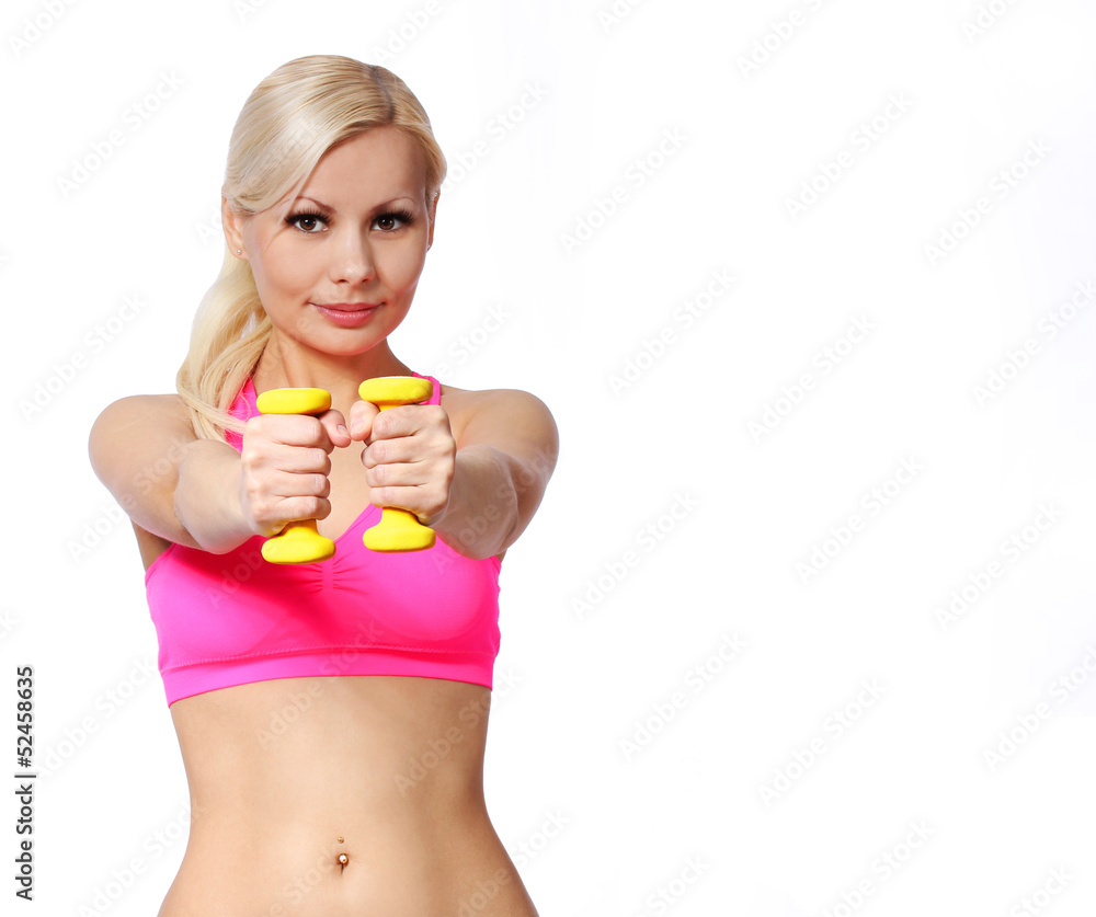 smiling blonde fitness woman lifting dumbbells.isolated smiling blonde fitness woman lifting dumbbells.isolated