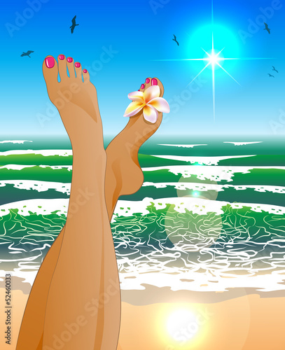Female legs against the sunny beach