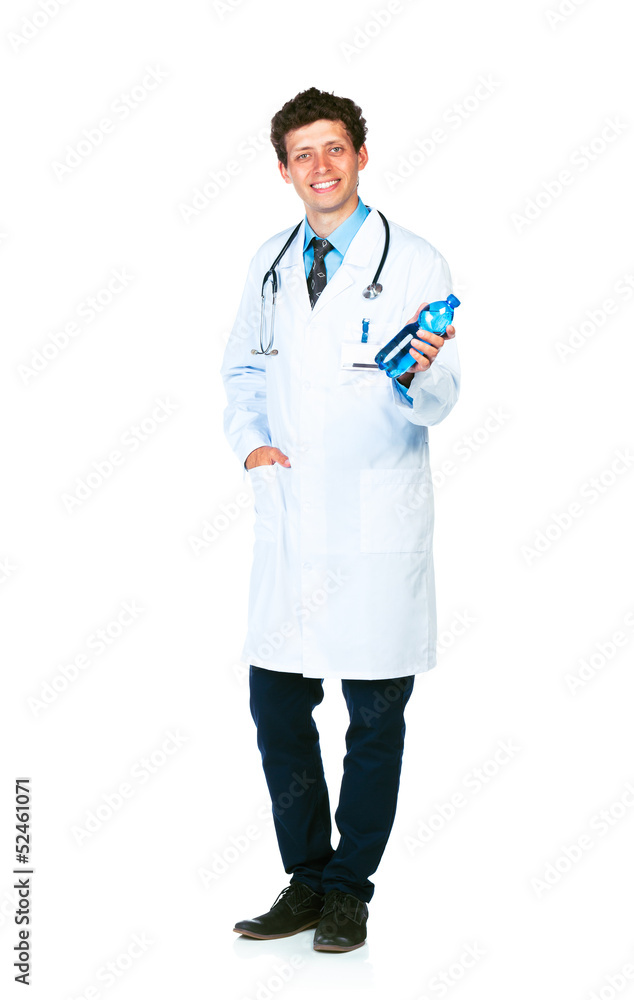 Smiling doctor holding bottle of water on white Smiling doctor holding bottle of water on white