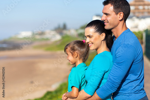 hapy family looking at sea view © michaeljung