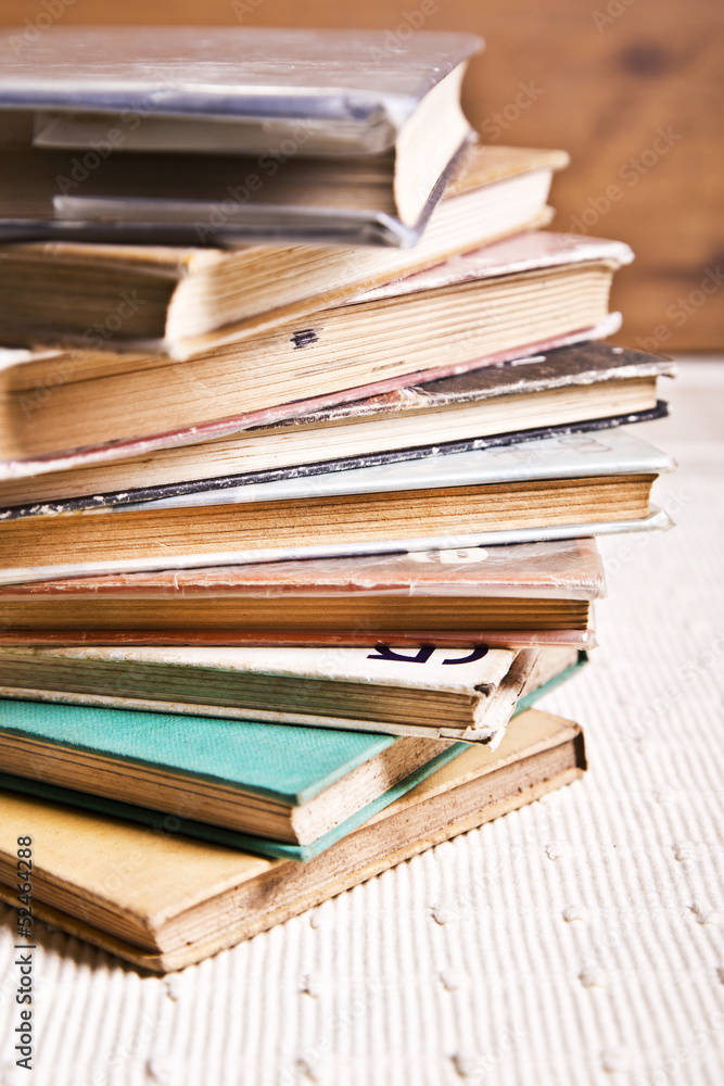 Books stacked on top of each other Books stacked on top of each other
