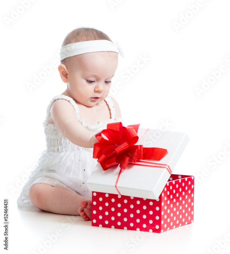 baby girl opening gift box
