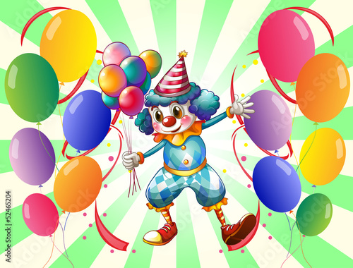 A clown between a group of balloons