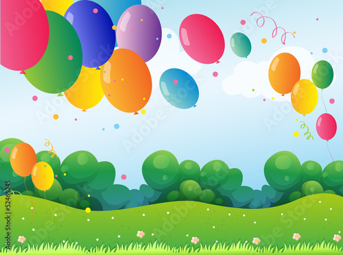 Colorful balloons at the hill