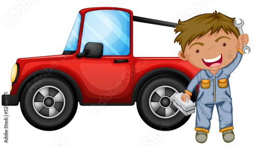 A boy fixing the red jeep