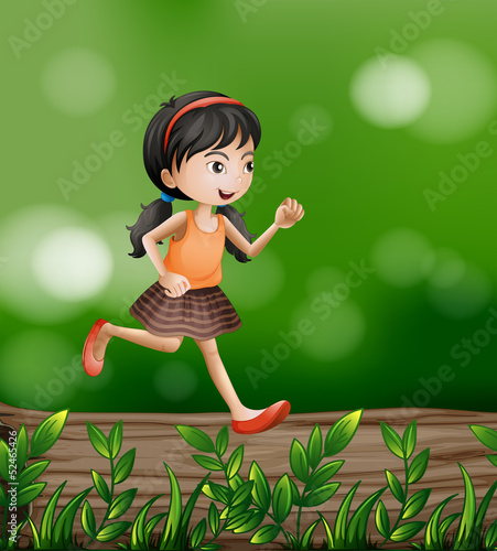 A girl running at the forest
