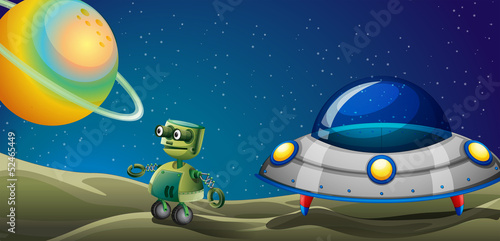 A robot beside a flying saucer