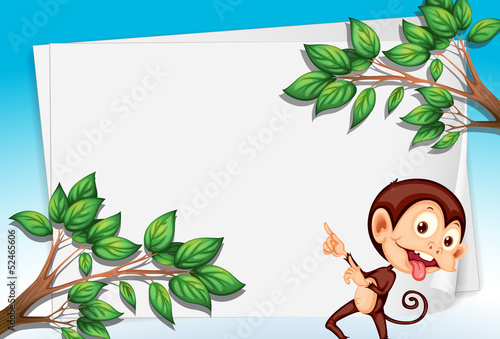 A monkey pointing the empty paper