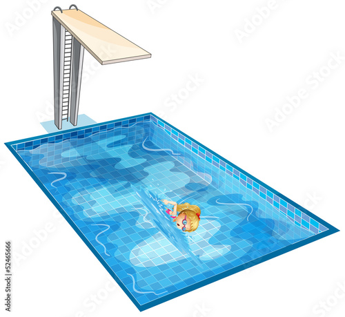 A girl swimming at the pool with a diving board