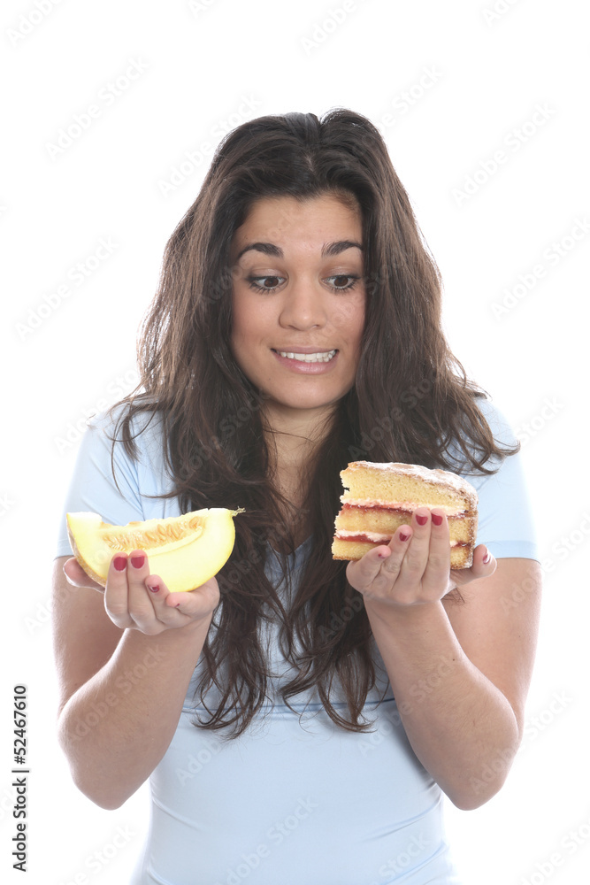 Model Released. Young Woman Holding Melon and Cake Model Released. Young Woman Holding Melon and Cake