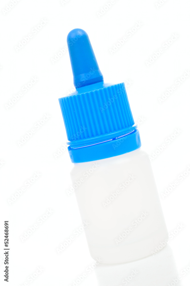 Empty white plastic bottle with a blue cap-dropper Empty white plastic bottle with a blue cap-dropper