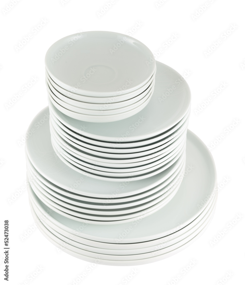Pile of clean white dish plates isolated Pile of clean white dish plates isolated