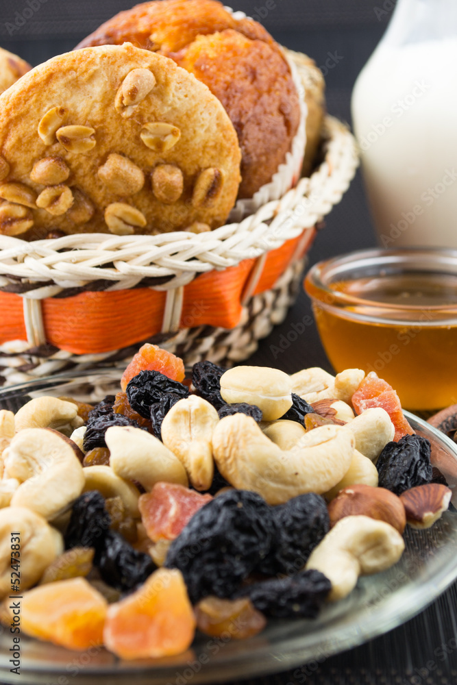 Fototapeta premium Nuts and dried fruits mix and baked peanut butter cookies