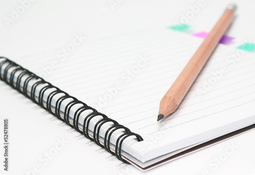 notebook with pencil