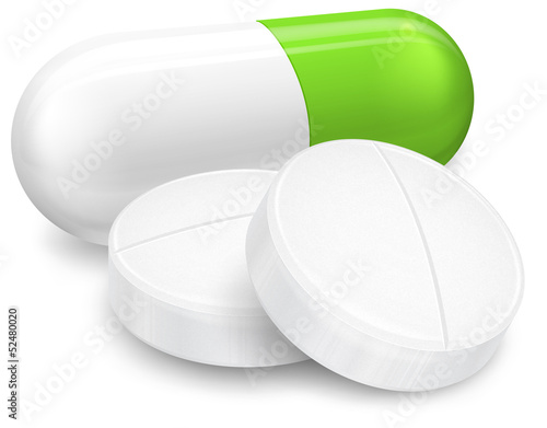 Different pills on white